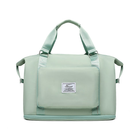 Light green convertible backpack handbag with front pocket and sturdy handles by CJ
