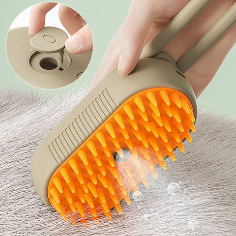CJ electric pet grooming brush with orange silicone bristles being used on pet fur
