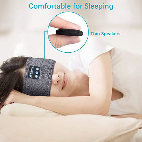 CJ wireless Bluetooth sleep headphones headband with thin speakers worn by woman sleeping comfortably