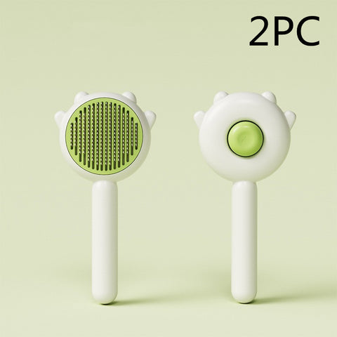 CJ Pet's Collection 2pc pet hair removal brush set with green bristles and ergonomic white handles