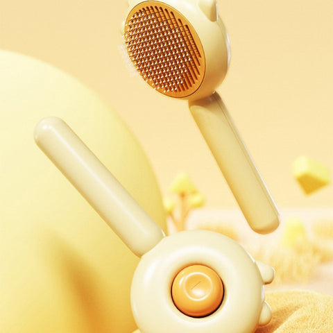 CJ pet hair removal brush with ergonomic handle and fine bristles in beige from Pet's Collection