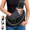 Portable pet carrier bag in black mesh with comfortable strap holding small dog securely