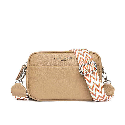 CJ rhombus embroidered crossbody bag in tan leather with patterned adjustable strap