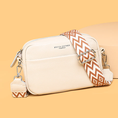 CJ white rhombus embroidered crossbody bag with textured leather and patterned adjustable strap