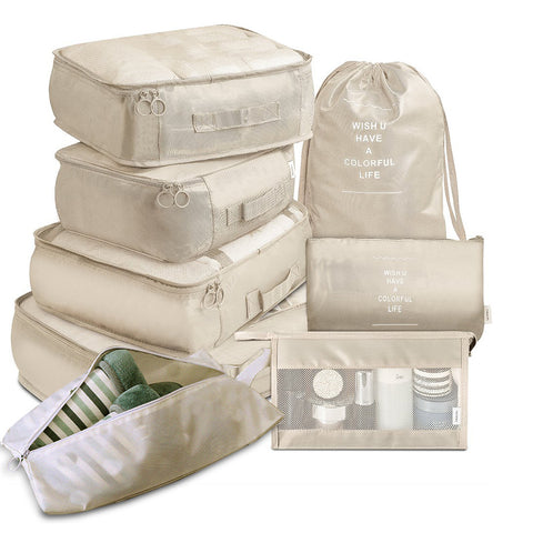 CJ beige 8-piece packing cube set including various travel organizers and shoe bag for efficient packing