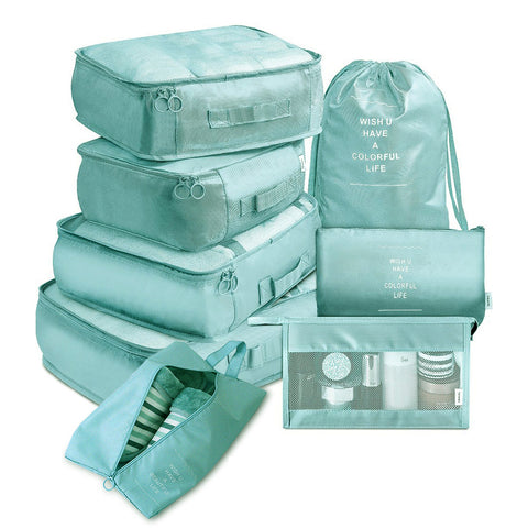 CJ 8-piece packing cube set in light teal for organized travel and efficient packing