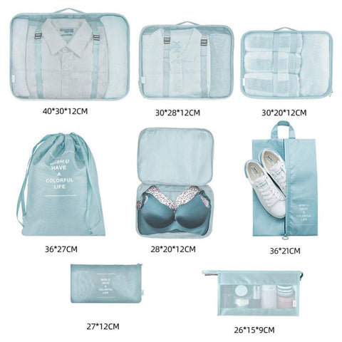 CJ 8-piece packing cube set in light blue for organized travel with multiple sizes and shoe bag
