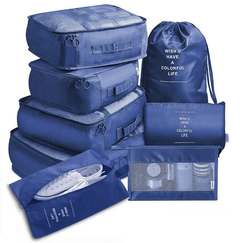 CJ 8-piece packing cube set in blue for organized travel and efficient luggage packing